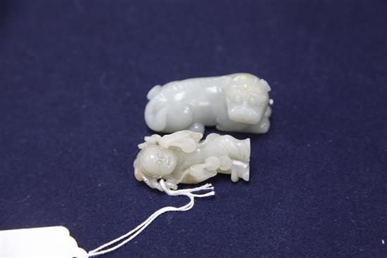 Two Chinese pale celadon jade figures of Liu Hai and his three legged toad and a recumbent lion-dog, 19th/20th century, length 6.6cm